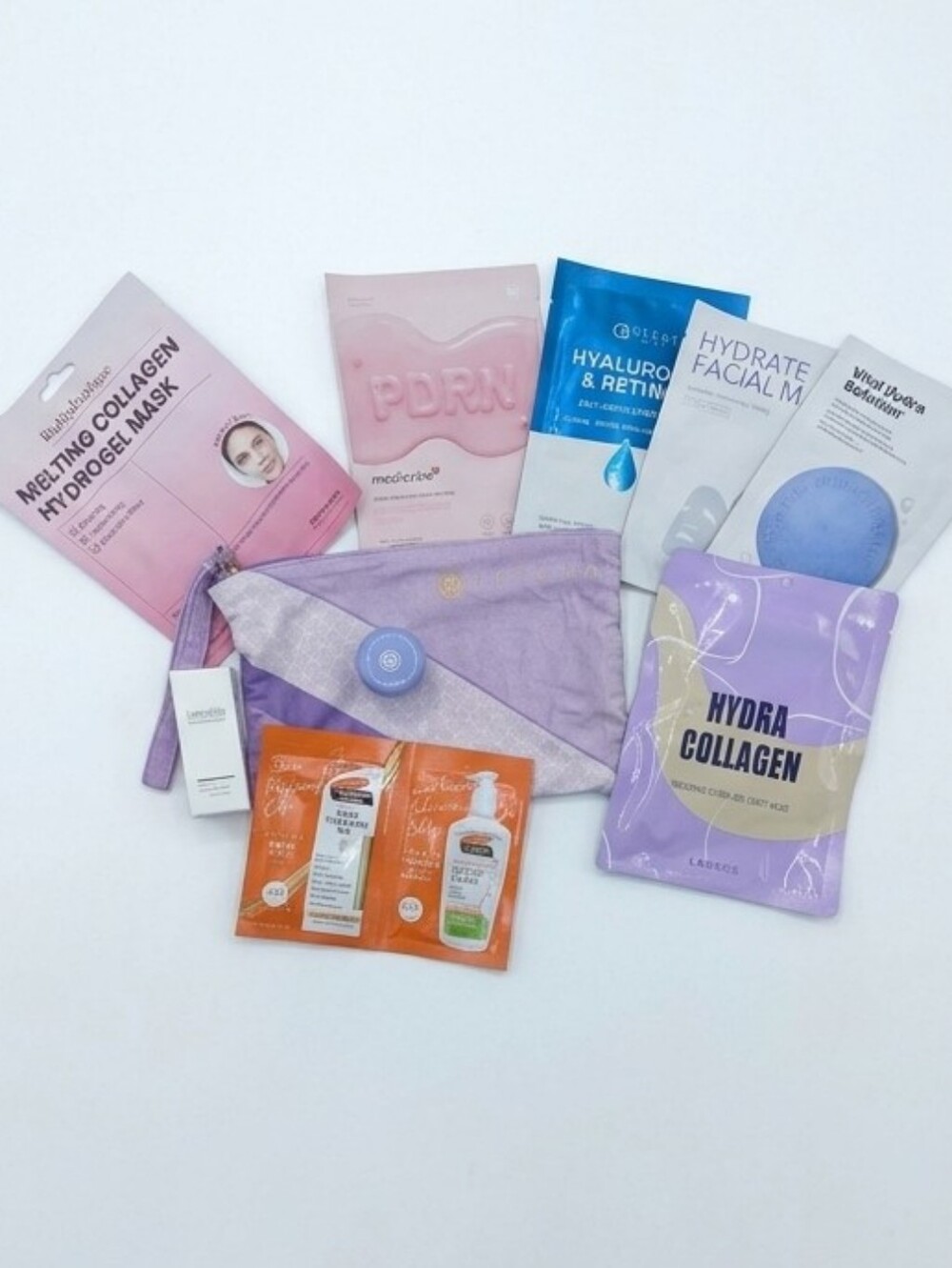 Tatcha Lavender and Lilac Skincare Travel Pouch with Skincare Items